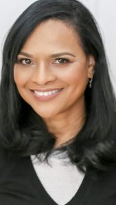 Lynn Simon-Thomas, a Travelers employee, featured in a professional headshot, representing leadership and expertise at Travelers.