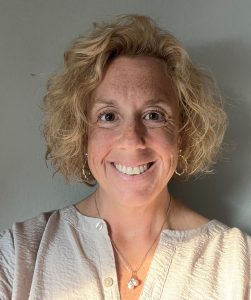 Tara DiBilio, a Travelers employee, featured in a professional headshot, representing leadership and inclusion at Travelers.