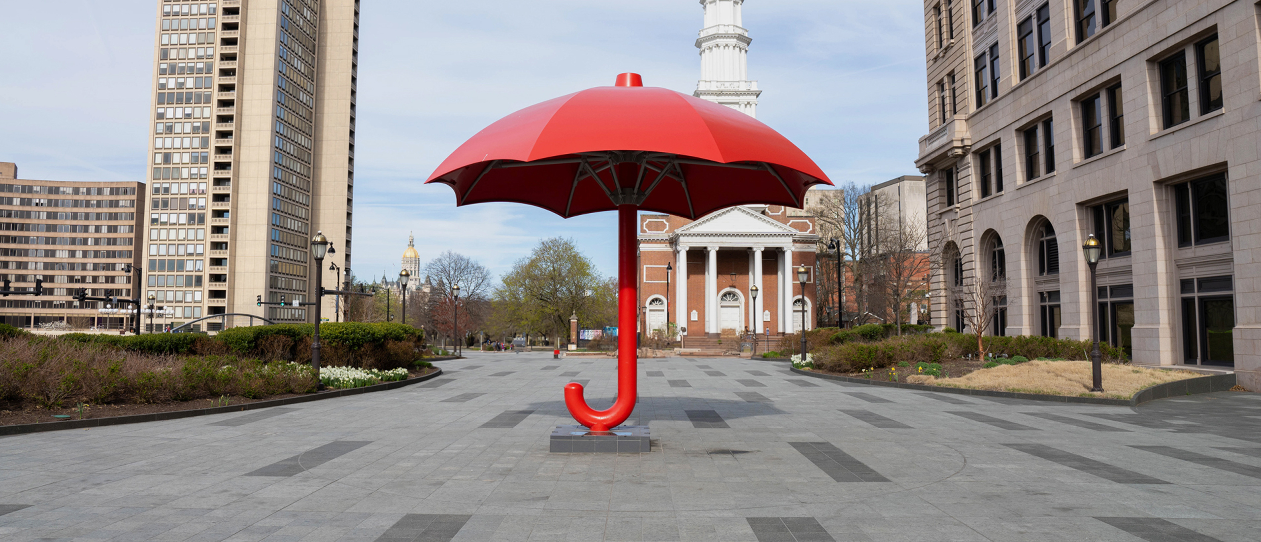 The Travelers umbrella statue located outside on Fishman Plaza in Hartford, CT.