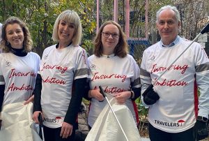 Travelers Europe employees volunteer at an event.