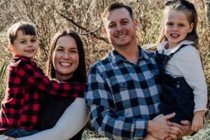 Erin with her husband and two children.