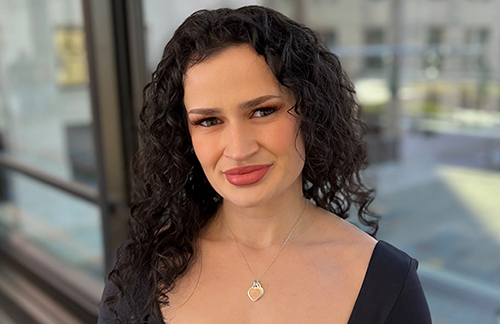 Belma Pehratović, a Travelers employee, featured in a professional headshot, representing inclusion and professional development at Travelers.