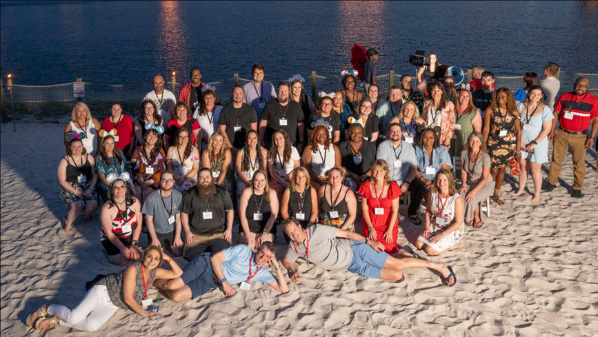 A group of diversion professionals spending time together at an offsite work conference, showcasing teamwork and professional development at Travelers.