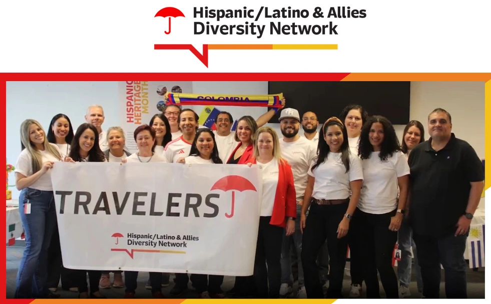 Hispanic Latino & Allies Diversity Network. Group of employees holding a Travelers banner at an event.